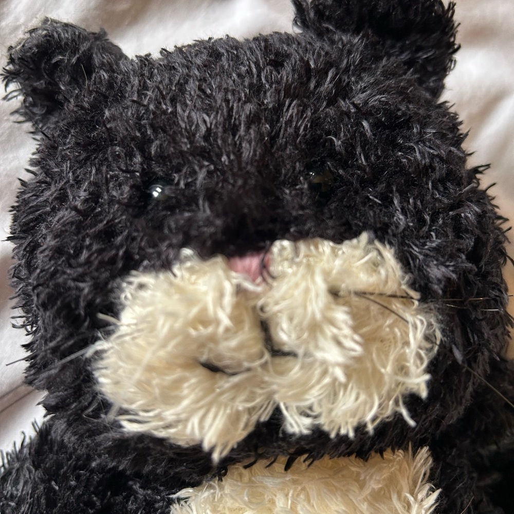 Jellycat medium black and white rare and discontinued. No tags but has the label